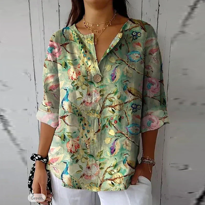 Damesblouse met bloemenprint – Losvallend model en V-hals met knoop