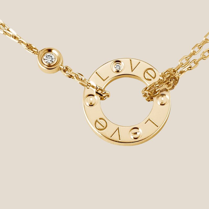 Dames ketting – Dubbele ketting met ronde hanger en gegraveerde tekst