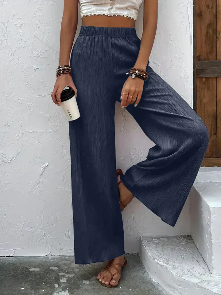 Dames broek – Wijde plissébroek met elastische tailleband