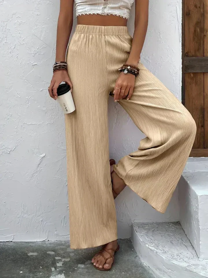 Dames broek – Wijde plissébroek met elastische tailleband