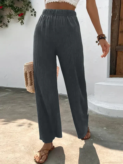Dames broek – Wijde plissébroek met elastische tailleband