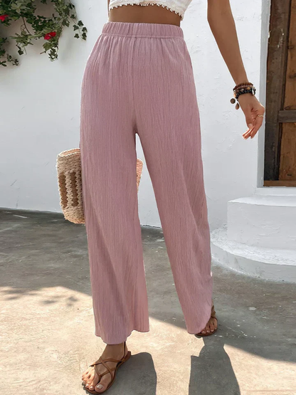 Dames broek – Wijde plissébroek met elastische tailleband