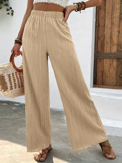 Dames broek – Wijde plissébroek met elastische tailleband