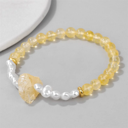 Dames Armband – Elastische Armband met Kruisvormige Natuursteen en Parelaccenten
