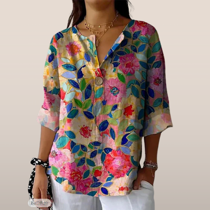 Damesblouse met bloemenprint – Losvallend model en V-hals met knoop